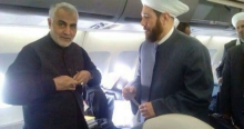 حاج قاسم سلیمانی و مفتی اعظم سوری در داخل هواپیما+عکس